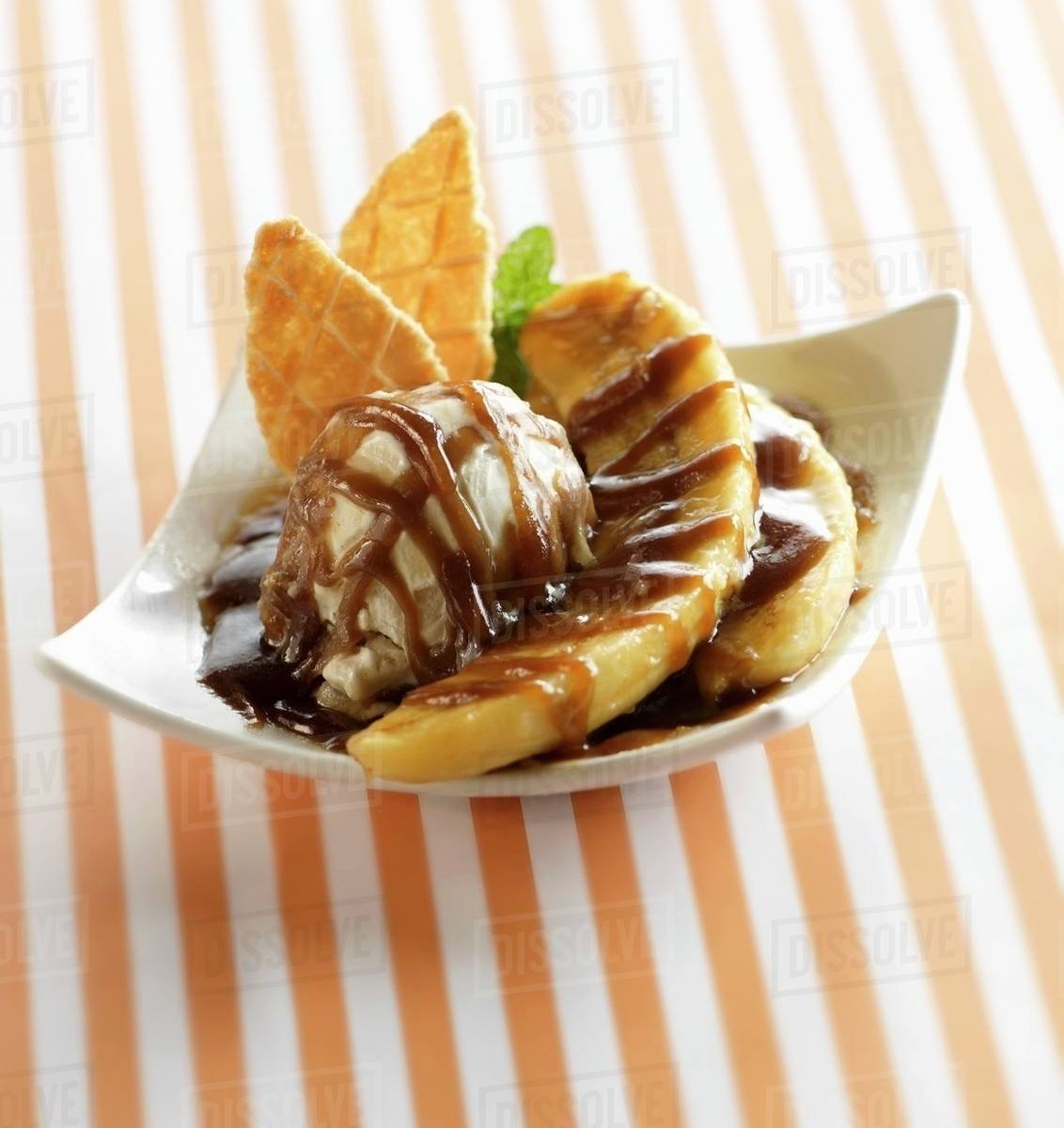 Banana Foster With Vanilla Ice Cream, Wafer Cookies And Caramel