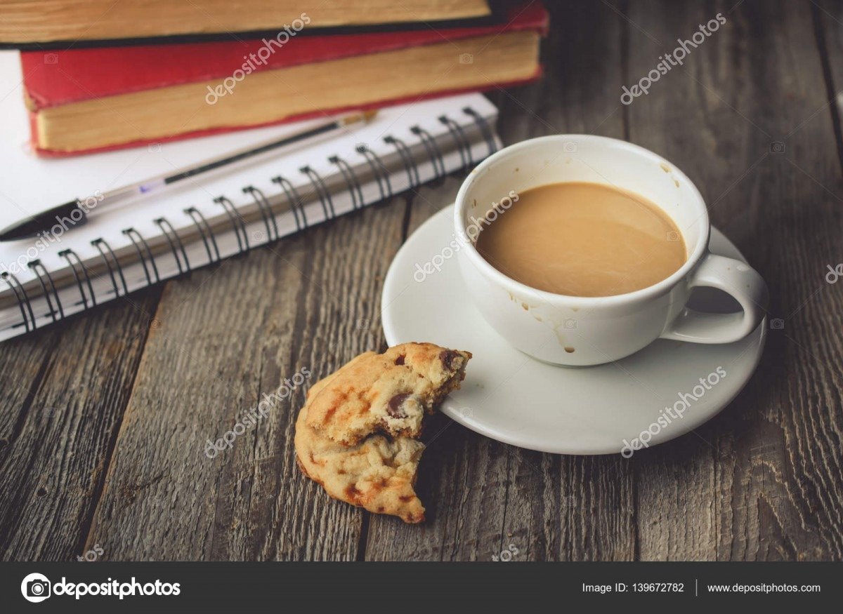 Stack Of Book And Cookies With Hot Coffee On Dirty Cup On Wood B